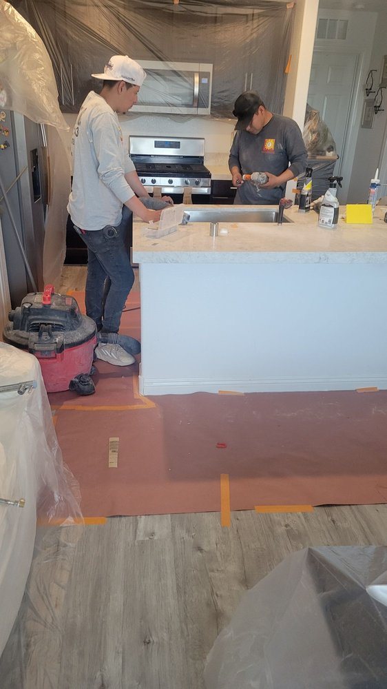 Rotech crew setting a countertop